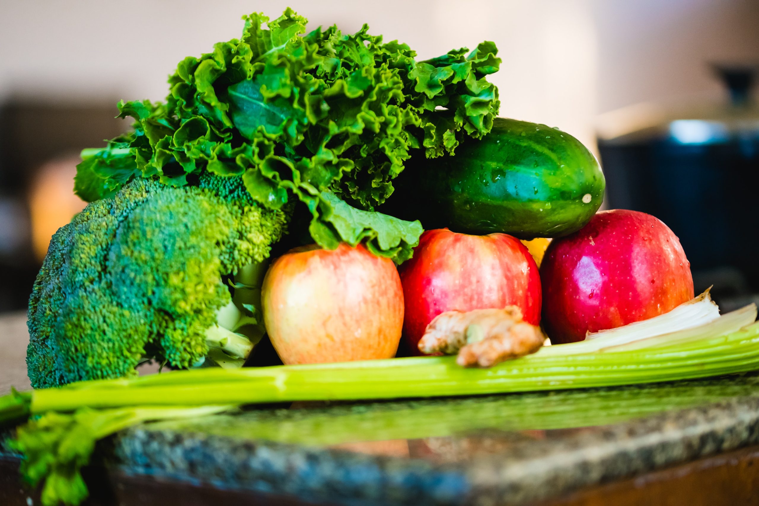 Fresh fruits and vegetables on a counter top with physical therapy.