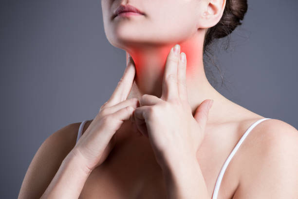 A woman seeking physical therapy to alleviate her neck pain.