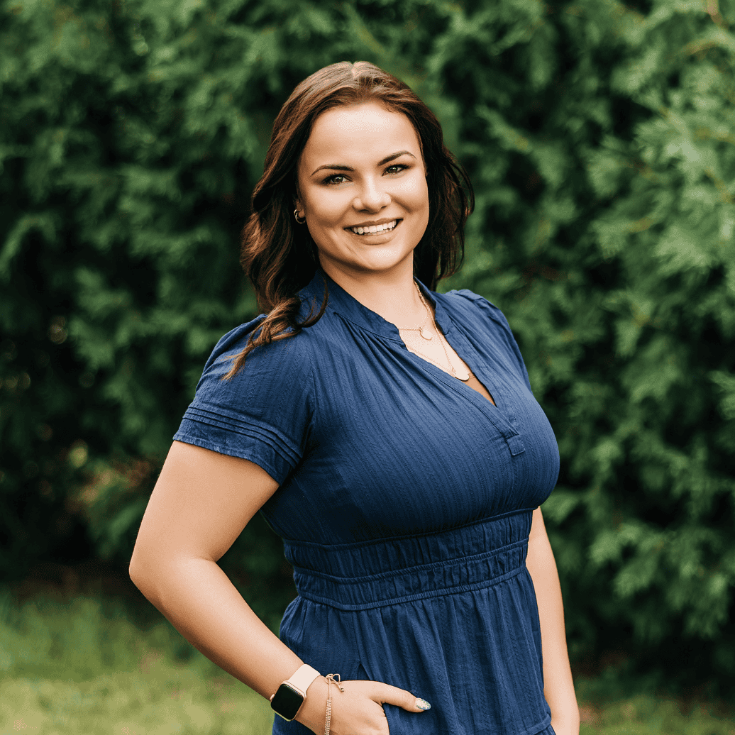 A scenic view of mountains under a blue sky.